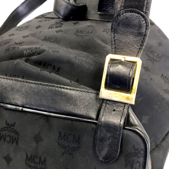 MCM MEDIUM SIDE ZIP BACKBACK MONO JACQUARD  BLACK FIRM SALE